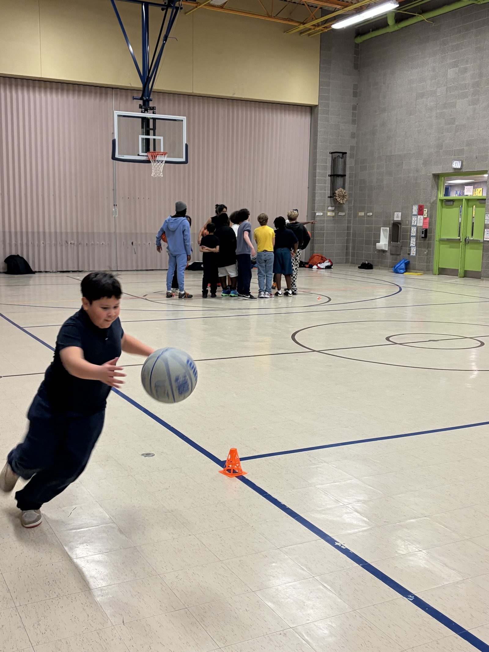 Horace Greeley student dribbling